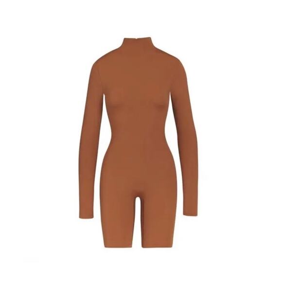 SKIMS Size Small ALL-IN-ONE LONG SLEEVE MID THIGH ONESIE CARAMEL NWT Jumpsuit - Picture 1 of 7